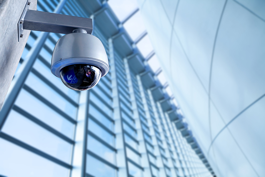 dome security camera on business building