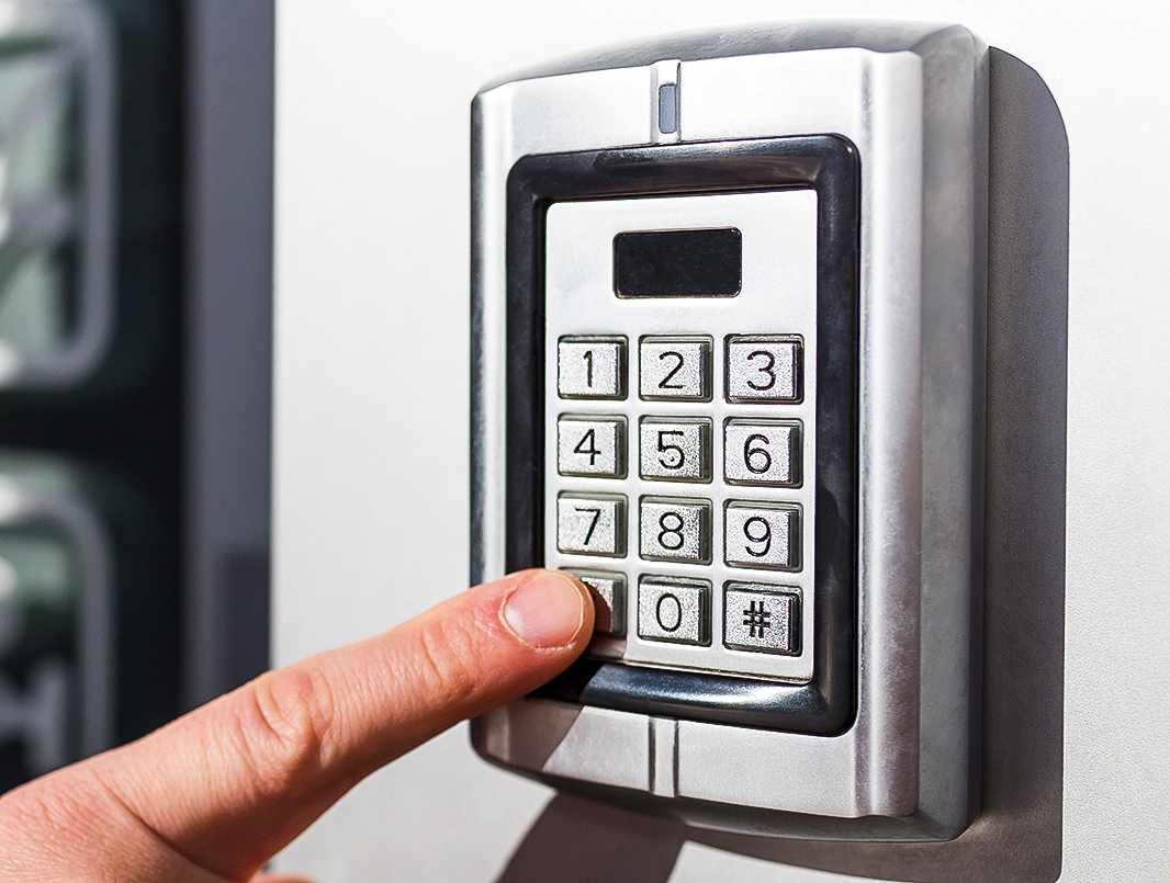 Person Using Business Access Control PIN Pad