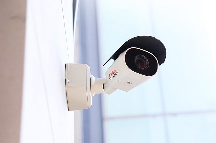 pass security bullet video surveillance camera on business building outdoor