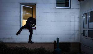 Burglar Breaking into Home by Climbing Through Bedroom Window in St. Louis Missouri