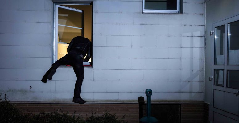 Burglar Breaking into Home by Climbing Through Bedroom Window in St. Louis Missouri